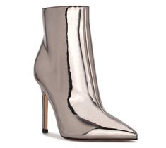 Update your ensemble with extra edge by donning these booties featuring a metallic upper and set on a sky-high stiletto heel. From Nine West. Party High Ankle Heeled Boots With Metal Feet, High Ankle Heels With Metal Feet For Party, Modern Boots For Party In Fall, Modern Party Boots For Fall, Metallic Pointed Toe Boots For Fall, Metallic Ankle Boots For Fall, Chic Metallic Silver Pointed Toe Heels, Elegant Metallic Boots With Pointed Toe, Chic Silver Heels For Fall