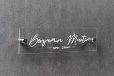 an acrylic sign on the wall that says, beginner matron aprn crip