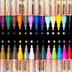 many different colored markers are lined up together