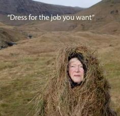 a woman is covered in hay with the caption dress for the job you want