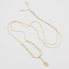 Delicate adjustable gold necklace with turquoise and gold beads and gold rectangle drop pendant. Beaded Chain Necklace, Link Design, Hanging Pendant, Long Pendant, Hanging Pendants, White Beads, Gold Filled Chain, Beaded Chain, Every Woman