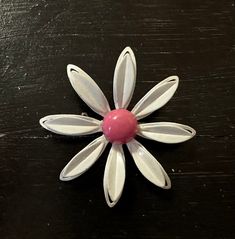 Vintage white and pink enamel flower floral daisy pin brooch. Clasp is in good working order. Retro White Flower Jewelry, White Vintage Brooch Lapel Pin, White Flower Brooches With Flower Decoration, White Retro Brooch For Gift, White Retro Style Brooch For Gift, Retro White Brooches As Gift, White Retro Brooches As Gift, Vintage White Flower Brooches, Vintage White Flower Enamel Pin