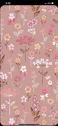 a pink background with flowers on it