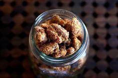 a glass jar filled with food sitting on top of a table