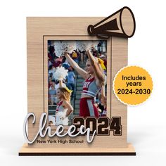 the new york high school cheerleaders are celebrating their 2012 - 2013 year with this wooden photo frame