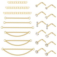 a set of gold chain and jeweled nose rings, with different chains on each side