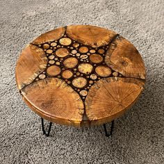 a coffee table made out of tree slices