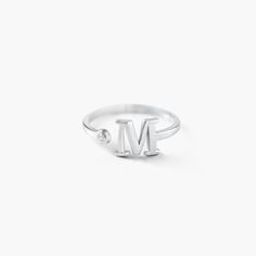 Size Guide  Safety PolicyCare InstructionsA simple Sterling Silver letter ring is a great addition to anyone’s jewelry collection. This ring is especially chic with a delicate design and personal detail.Updated Essentials. Created to wear every day, this piece was designed to be the anchor of your signature style. Inspired by classic aesthetics, updated with a little something extra. This versatile piece can be mixed with trends or simply worn.Customize me! Choose your letter! We suggest your in Silver Initial Ring, Luna Fashion, Message Necklace, Engraved Bar Necklace, S Jewelry, Letter Ring, Sterling Silver Initial, The Anchor, Round Necklace