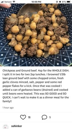 a blue bowl filled with food on top of a table