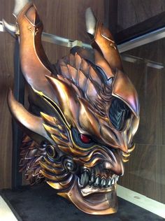 an elaborate mask on display in a store