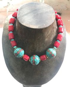 I've got this huge mosaic beads from an Afghan shop a few years ago.The  red dyed coral are from China .I love the combination of red coral and blue turquoise. The necklace is 45 cm. long  but if you wish to add a few beads more , please convo me. This necklace  goes well with simple dress or boho style! Your necklace will be wrapped with bubble and packed nicely in a gift box. Red Coral Spiritual Necklaces, Spiritual Red Coral Necklaces, Spiritual Red Coral Necklace, Red Artisan Necklace With Round Beads, Artisan Red Necklace With Round Beads, Unique Red Beaded Necklaces With Gemstone Beads, Red Gemstone Beads Necklace, Unique Red Gemstone Beaded Necklaces, Red Artisan Beads With Natural Stones