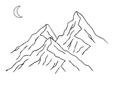 a mountain range with the moon above it