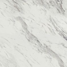 a white marble textured surface with grey veiners