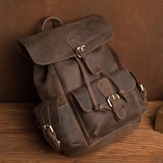 Crazy Horse Leather Backpack Retro Travel Backpack Unisex Laptop Backpack Model Number: MSG7531 Dimensions: 11.4"L x 7"W x 13"H / 29 cm(L) x 18 cm(W) x 33 cm(H) Weight: 4 lb / 1.9 kg Shoulder Strap: Adjustable Color: Dark Brown Features: • Genuine Natural Leather• Inside 1 Zipper Pocket, 1 Wallet Pocket. 1 Cell Pocket, 1 Front Pocket, 2 Side Pockets, 2 Back Pockets.• YKK Zipper• Adjustable Shoulder Strap• Can fit a 13" Laptop. Dark Academia Bag, Vintage Leather Books, Leather Book Bag, Full Grain Leather Wallet, Laptop Travel Bag, Laptop Travel, Leather Laptop Backpack, Brown Leather Backpack, Laptop Shoulder Bag