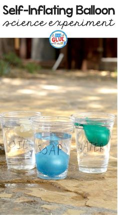 three small cups with blue and green liquid in them