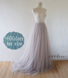 a dress on a mannequin with the words, 600 colors any size