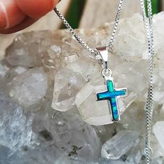 Handmade and beautifully Designed sterling silver 925 cross combined with natural fire Opal gemstones! Symbolizes modesty and powers, represented by the cross and the Opal gems. ooooo ♣ Pendant: 2 x 0.8 cm / 0.8 x 0.3 Inch ♣ 925 Sterling silver 16.5/ 18 Inch chain included for FREE! *In Centimeters = 42/ 45 cm respectively. *Selection criteria listed in the above shopping window ♣ Arrives in gift box ♣ Enjoy FREE SHIPPING worldwide. Suitable for both men and women oooooo If you have any question Spiritual Cross Shaped Gemstone Necklace, Spiritual Cross-shaped Gemstone Necklace, Sterling Silver Cross Necklace With Gemstone, Sterling Silver Cross Necklace With Birthstone, Gemstone Pendant Cross Necklace For Gift, Spiritual Sterling Silver Cross Necklace, Silver Cross Necklace, Sterling Silver Cross Necklace, Tiny Cross