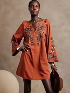 Embroidered Mini Dress | Banana Republic Factory Fall Split Neck Tunic, Fall Mini Dress With 3/4 Sleeve For Brunch, V-neck Tunic For Work In Fall, Long Sleeve Brown Tunic For Fall, Brown Long Sleeve Tunic For Fall, Workwear Mini Dress With Bell Sleeves, Split Neck Mini Dress For Work, Chic V-neck Tunic For Fall, Embroidered Mini Dress