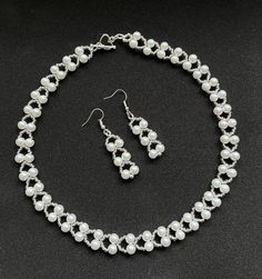 "White Glass Pearl Necklace Set   Pearl & Seed Bead Glass Set Necklace  & Matching Earrings Elegant Vintage Design     6mm white glass pearls     11/0 silver seed beads     Strung in flowing design     Necklace  measures 16\" in length     With Heart shaped T-bar     Earrings in a drop design     Silver  plated hooks   This design can be altered in length to suit needs Like it but in a different colour? Please just send me a message" Elegant Beaded Earrings, Elegant Pearl Spacer Beads, Elegant Pearl Necklace With Spacer Beads For Wedding, Beaded Metal Pearl Necklace With Round Beads, Elegant Polished Beads Earrings For Party, Elegant Pearl White Necklace With Spacer Beads, Elegant Party Earrings With Polished Beads, Handmade Silver Pearl Beads, White Metal Jewelry With Silver Beads