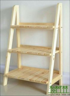 a wooden shelf sitting on top of a white floor