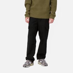 Color: Black - The Regular Cargo Pant is made of midweight cotton Columbia ripstop, which has been rinsed for a softer feel. The style is cut in a regular fit with a low waist and features double-layer knees, adding to its robust qualities. Multiple pockets throughout nod to the garment's military-style influences, and tie detailing at the cuffs allow for the fit to be adjusted. The Aviation Pant () offers the same lightweight quality construction with a slimmer fit. _* Columbia ripstop: 100% co Winter Cotton Cargo Pants With Relaxed Fit, Winter Cargo Jeans With Pockets In Cotton, Winter Straight Leg Cotton Cargo Pants, Winter Cotton Straight Leg Cargo Pants, Winter Cargo Style Cotton Parachute Pants, Winter Cotton Cargo Parachute Pants, Winter Techwear Cargo Pants With Straight Leg, Winter Techwear Straight Leg Cargo Pants, Winter Techwear Cotton Cargo Pants