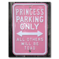 a pink sign that says princess parking only all others will be toad