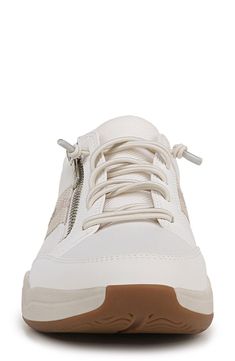 Whether you zip it on or slip it on, this walking sneaker, defined by court shoe styling, will be an instant favorite on or off the court. The polished yet casual sneaker is designed for a woman's unique foot shape, muscle movement and build with a narrower heel, roomier toe and softer foot cushioning. The grippy and responsive rubber outsole is lab-tested by Heeluxe and promotes stability and traction for lateral movement. The anatomical insole is designed to comfortably support your arch and h Sporty Sneakers With Zipper Closure For Streetwear, Sporty High-top Sneakers With Zipper For Streetwear, Sporty High-top Sneakers With Zipper, Low-top Sneakers With Zipper For Streetwear, Sporty Leather Sneakers With Zipper Closure, Sporty High-top Sneakers With Zipper Closure, White Low-top Running Shoes With Arch Support, Low-top Sneakers With Zipper Closure For Streetwear, White High-top Sneakers With Zipper