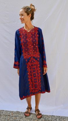 Love this beautiful ethnic, caftan style dress.  It's comfortable without being frumpy.  The color combination is fresh and fun.  The embroidery down the front makes the dress and gives it that ethnic feel.  Great to pack for a vacation or to wear around the house or for a summer evening party. Traditional Blue Kaftan For Navratri, Bohemian Blue Dresses With Geometric Embroidery, Blue Bohemian Dress With Geometric Embroidery, Traditional Blue Dress With Geometric Embroidery, Blue Bohemian Dress With Traditional Patterns, Blue Dress With Embroidered Border For Festival, Traditional Blue Tunic Dress, Festive Blue Folk Dress, Bohemian Tunic With Resham Embroidery For Navratri