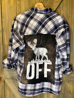 Artfully distressed, upcycled and sustainable flannel shirt paired with upcycled tee with graphic.  Unisex in style but sourced from a variety of brands so resized for a roomy women's fit.  All one of kind and unless noted, flannel is medium weight.  Show your sense of humor and  with this fun flannel only you will have. Casual Fall Tops With Patches, Fall Cotton Flannel Shirt With Graphic Print, Fall Flannel Top With Graphic Print, Plaid Cotton Flannel Shirt With Graphic Print, Fall Flannel Shirt With Graphic Print, Fall Graphic Print Flannel Shirt, Upcycled Cotton Tops For Fall, Plaid Flannel Tops With Graphic Print, Casual Distressed Plaid Tops