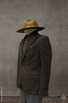 Made in Japanese herringbone cotton. Over dyed Super deep color with a texture look due to the slightly crinkled effect. Single breasted with soft shoulder lightly padded. Peak lapel. Split back yoke lining. Deep brown corozo buttons. Contrast buttonhole color at cuff. Made in New York. Mens Hats Fashion, Fedora Hat Men, Mens Hats, Hats Fashion, Mens Attire, Safari Jacket, Hat Men, Peak Lapel, Mens Wear