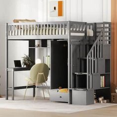 a loft bed with a desk underneath it and stairs leading up to the top floor