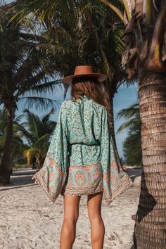 Product Details: Dreaming of the beach Open front Long sleeves Bohemian style Material: Cotton, Rayon Casual Boho Print Festival Cover-up, Boho Print Cover-up With Kimono Sleeves For Beach Season, Tropical Long Sleeve Cover-up For Beach Season, Festival Boho Print Beachwear Cover-up, Bohemian Flowy Long Sleeve Kimono, Long Sleeve Boho Dress For Beach Season, Long Sleeve Boho Dress For Beach Season Day Out, Bohemian Green Tunic Kimono, Summer Bohemian Long Sleeve Kimono