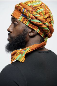 Imagining the vibrant colors of the African landscape, our uniquely crafted 100% cotton Kente Turban, affectionately named "Asase" after the Ghanaian earth goddess, is a true masterpiece by Dupsie's African Fashion. This pre-wrapped Turban in Orange, Green, Black, Off-White, Blue, and Burgundy African Print showcases the rich history and culture of African fashion, securing its place as a must-have accessory for men. The tradition of Turbans in African fashion dates back centuries, symbolizing n Multicolor Cotton Bandana, Traditional Adjustable Summer Turban, Adjustable Traditional Summer Turban, Traditional Summer Headwrap One Size, Traditional One-size Summer Headwrap, Traditional Multicolor Headwrap With Matching Headband, Traditional Adjustable Multicolor Headwrap, Multicolor Turban With Matching Headband, Bohemian Cotton Headwrap For Festivals