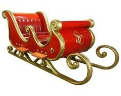 a red and gold sleigh is shown on a white background