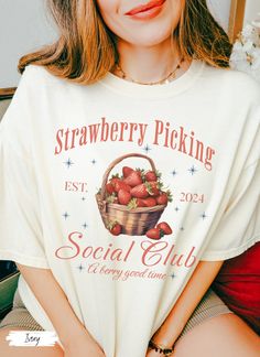 Cute Strawberry Tshirt, Comfort Colors Summer Strawberry Shirt, Cottagecore Berries Tshirt, Strawberry Aesthetic, Botanical Garden Tshirt Custom made just for you! 💜Premium Comfort Colors Tee Shirt💜 The perfect shirt to go picking strawberries in! Cute strawberry picking social club shirt. HAs cute basket of strawberries, est, 2024 date, Strawberry picking social club shirt. Cute group shirt for girls weekend or a fun trip to the farmers market. Cute summer tee for her. Gift for strawberry lov White Cottagecore T-shirt For Summer, Cotton Cottagecore Short Sleeve T-shirt, Cottagecore Crew Neck T-shirt For Summer, White Cottagecore T-shirt With Crew Neck, Cottagecore White Crew Neck T-shirt, White Cottagecore Crew Neck T-shirt, White Relaxed Fit Cottagecore T-shirt, Cottagecore Graphic Print T-shirt, Cottagecore Graphic Print Short Sleeve T-shirt