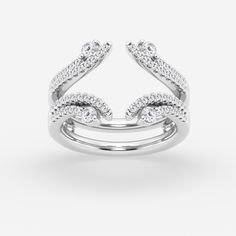 a white gold ring with diamonds on it