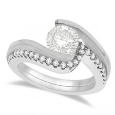 a white gold ring with diamonds on it