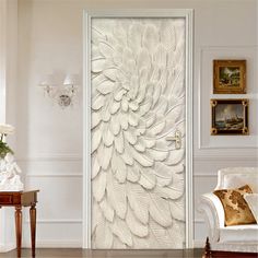 the door is decorated with white flowers and leaves on it's glass paneling