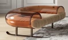 an oval shaped chair sitting on top of a rug