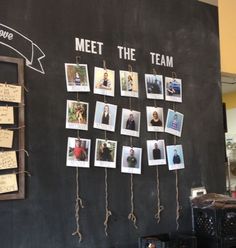 a blackboard with pictures and writing on it that says meet the team hanging from ropes