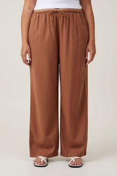 Haven Wide Leg Pant Beige Linen Pants With Drawstring, Relaxed Fit Brown Bottoms With Elastic Waistband, Full Length Linen Bottoms For Loungewear, Beige Linen Drawstring Pants, Solid Linen Loungewear Bottoms, Flax Trousers With Elastic Waistband, Wide Leg Linen Bottoms With Drawstring, Linen Wide Leg Bottoms With Drawstring, Comfortable Linen Wide Leg Pants With Elastic Waistband