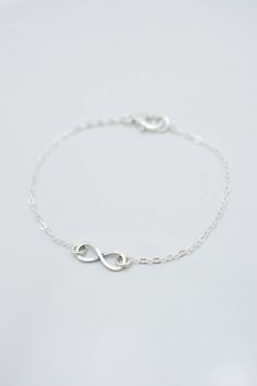 HAND-MADE OF SOLID STERLING SILVER PARTS - A GREAT KEEPSAKE I make this beautiful bracelet using a tiny 1/2 inch sterling silver infinity charm with an antiqued finish. Set on sterling silver chain, this bracelet secures with a lobster clasp. Each comes in a gift box, perfect for gift-giving. These make great group gifts. SIZING - IMPORTANT: To determine bracelet size, measure around your wrist and add 1/2 inch to get your bracelet size. Do not order in your exact wrist measurement as it will NO Simple Silver Jewelry For Friendship, Simple Hypoallergenic Sterling Silver Bracelets, Hypoallergenic Sterling Silver Infinity Jewelry, Hypoallergenic Infinity Sterling Silver Jewelry, Simple Sterling Silver Bracelets In Silver, Simple Sterling Silver Bracelets, Minimalist Silver Infinity Bracelet, Sterling Silver Infinity Bracelets For Everyday, Sterling Silver Infinity Bracelet For Everyday