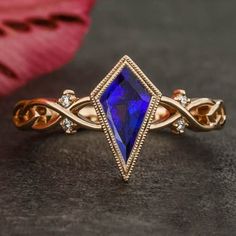 This is Christian Buschi. I am a specialist in making jewelry in artistic designs. If you want me to prepare rings set of your thoughts, share your vision and I'll shape that vision to reality. SKU Number - N/A Material - 14K/18K Solid Gold Gemstone - AAA+ Natural Violet Blue Tanzanite Gemstone Gemstone Shape -Kite Gemstone Size - 11.50x6.50 mm Gemstone Weight - 1.35ct Natural white Diamond accents Metal stamp - 14K /18K Occasions - Engagement , wedding , birthday , anniversary etc. Unique Sapphire Ring For Anniversary, Sapphire Marquise Cut Ring For Gift, Unique Sapphire Ring With Center Stone, Unique Blue Crystal Wedding Ring, Marquise Cut Sapphire Rings For Gifts, Blue Trillion Cut Jewelry Gift, Blue Marquise Cut Jewelry For Gift, Trillion Cut Jewelry With Bezel Setting As Gift, Trillion Cut Bezel Set Jewelry For Gifts