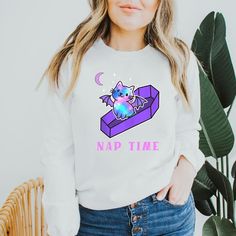 This super cozy oversized sweater is purrrrfect for Halloween, fall, and basically all year round cuz we love kawaii pastel and this cat bat is EVERYTHING Witch Aesthetic Fashion