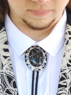 Custom Snowflake Obsidian Bolo Tie with either Silver, Gold or Copper Rope Fancy Scallop Setting. Great for your wedding or special occasion! You pick the exact stone, color of setting and matching end caps along with either genuine leather bolo cord or vegan leather cord and color. The setting is very elegant and the black enamel really makes the designs pop! The Bolo Setting in this listing is made in the USA and have a Tension Clasp that is leather cord friendly! There is something so classy Bolo Tie Men, Mens Wedding Ties, Wedding Tie, Bolo Ties, Tie Men's, Snowflake Obsidian, Bolo Tie, Wedding Ties, Black Agate