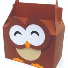 a brown box with an owl cut out of it