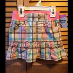 Pink, Brown, Beige And Green Plaid Skirt With Pockets, Ruffle Bottom With Attached Pink Boy Shorts And Elastic Pink Ribbed Waist. Size 4t. 100% Cotton. Nwt Pink Cotton School Bottoms, Playful Pink Bottoms For School, Pink Casual Bottoms For School, Casual Pink School Bottoms, Casual Pink Bottoms For School, Playful Bottoms For School In Spring, Pink Boyshorts, Pink Plaid Skirt, Pink Boy