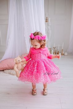 Step into a world of glitz and glamour with our Sparkling Tutu Toddler Birthday Dress. Perfect for any special occasion, this dress is crafted with the finest sequined material that will make your little one shine like a star. The exquisite design features a layered tulle skirt with a sparkling bodice adorned with sequins that will leave you speechless. Whether it's for a birthday, flower girl, pageant, prom, or smash cake photoshoot, your little princess will steal the show in this dress. Made Toddler Birthday Dress, Cake Photoshoot, Baby Birthday Dress, Photo Dress, Girls Maxi Dresses, Draping Fashion, Cake Photo, Birthday Flower