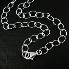 "Material: 925 Sterling silver made in Italy. The chain size is about 8mm long, 6mm wide. Length - 7, 7.5\" (Bracelet), 9.5, 10\" (Anklet), 16- 36 inches (Necklace) Quantity - 1 piece. SKU: 601046 For this chain in gold plated sterling silver, click here: https://www.etsy.com/listing/500243175 Please convo me for large quantity. Pictures show the shape of the chain,for actual size please read the measurement. For our entire selection of chunk chains, click here: https://www.etsy.com/shop/BeadUni Silver Oval Link Charm Bracelet, Silver Charm Bracelet With Oval Link, Sterling Silver Oval Link Chain Charm Bracelet, Oval Link Sterling Silver Charm Bracelet With Chain, Sterling Silver Rolo Chain Bracelet With Oval Links, Sterling Silver Rolo Chain Bracelet, Gift, Oval Link, Sterling Silver Rolo Chain Bracelet Gift, Chunky Silver Necklace, Extra Long Necklace