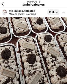 there are many cupcakes in tins with oreo cookies and cream on them